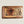 Load image into Gallery viewer, Wooden dugout with dark “MOTHER MURPHY’S” lettering on honey-brown wood
