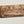 Load image into Gallery viewer, Wooden dugout with dark engraved emblem on distressed natural wood finish
