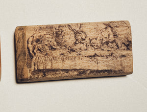 Wooden dugout with dark engraved emblem on distressed natural wood finish